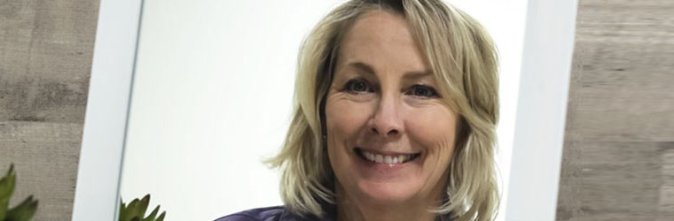 Woman in the mirror: "educate yourself about personal finance"