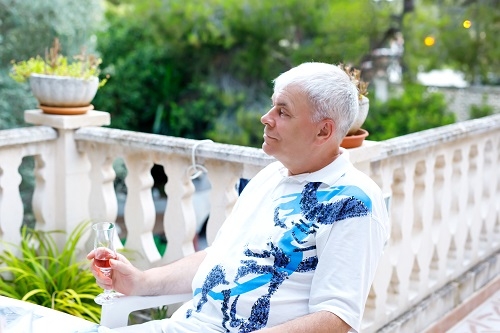 Man relaxing with wine