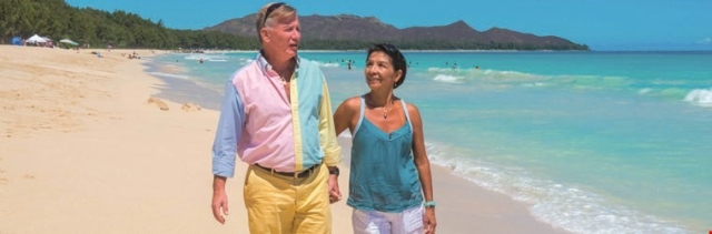 Couple walking on the beach