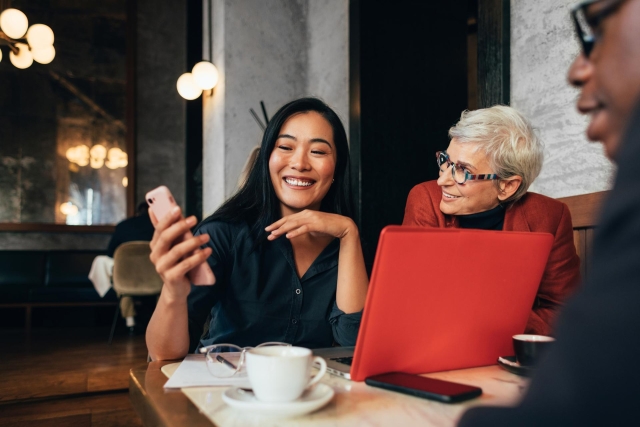 Asian woman, senior woman and African-American man