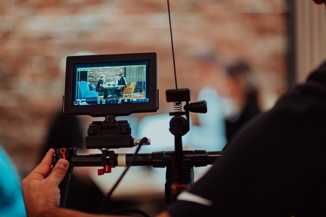 Behind the camera