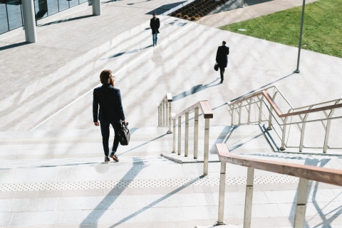 Business man stairs walking architecture building 